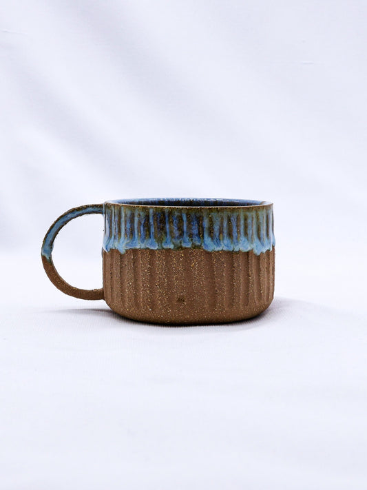 Handmade Terra Stoneware Mug by Ribera Handmade Ceramics with a rustic ceramic finish and unique artisanal design.