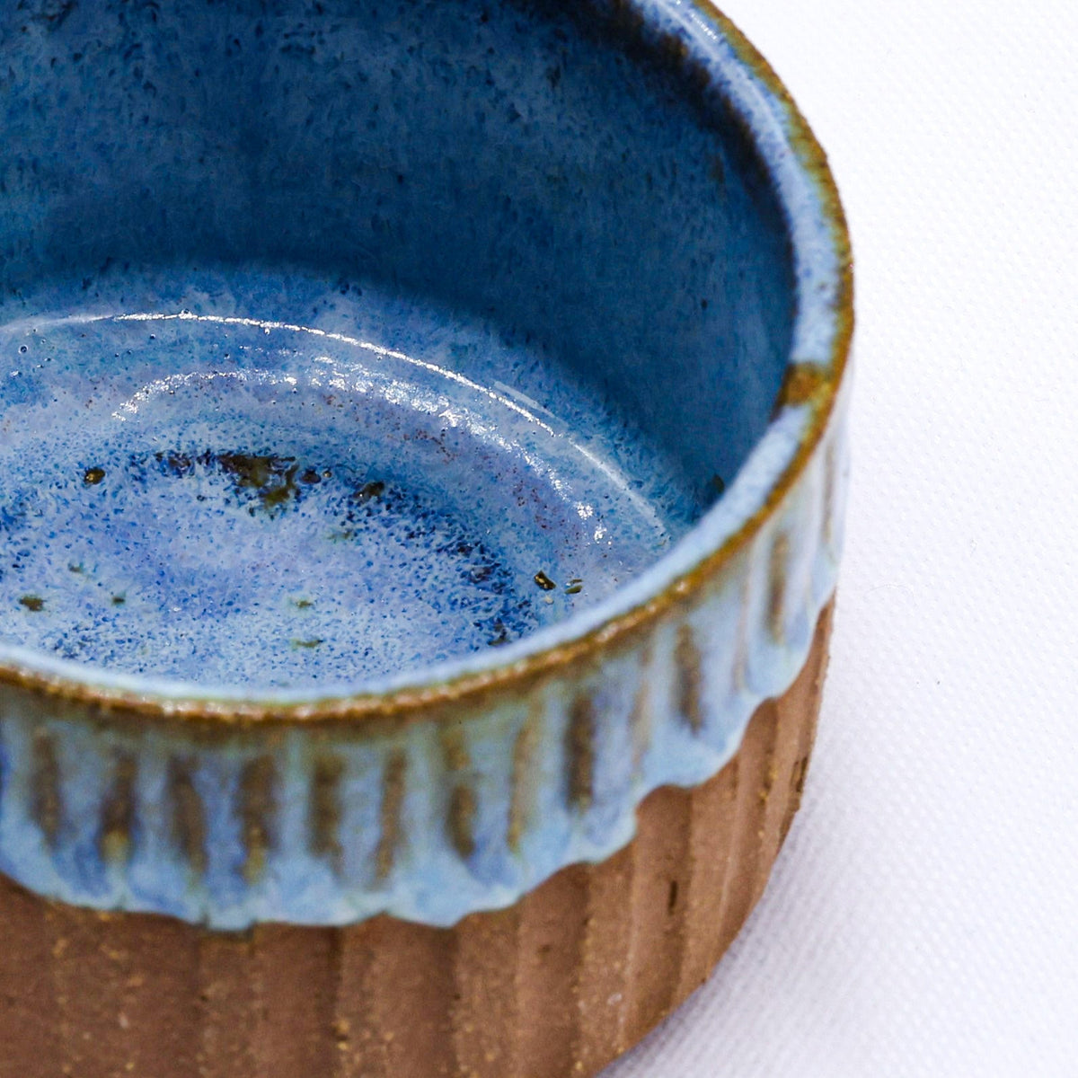 Handmade ceramic Terra Stoneware mug by Ribera Handmade Ceramics with a rustic glazed finish and textured surface.