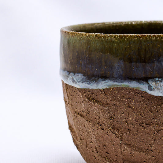 Handmade ceramic Terra stoneware mug by Bluverde Scultura from Ribera Handmade Ceramics, featuring a textured, earthy finish.