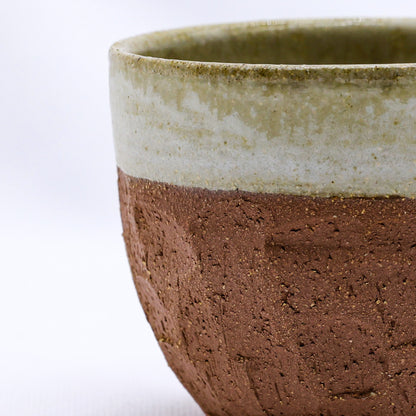 Beige handmade ceramic terra stoneware mug by Ribera Handmade Ceramics with a textured, artisanal finish.