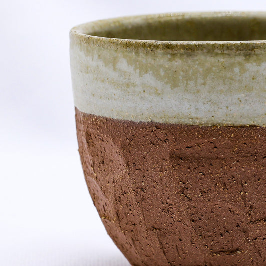 Beige handmade ceramic terra stoneware mug by Ribera Handmade Ceramics with a textured, artisanal finish.