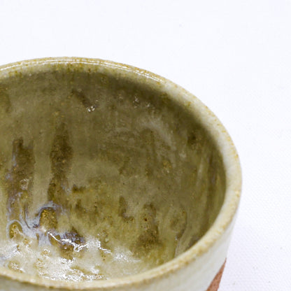 Beige handmade ceramic Terra stoneware mug by Ribera Handmade Ceramics, featuring a textured, artisanal design and sturdy handle.