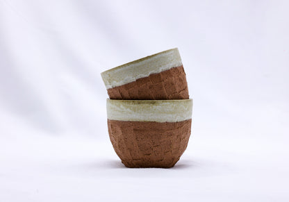 Beige handmade ceramic Terra stoneware mug by Ribera Handmade Ceramics, featuring a textured, artisanal design.