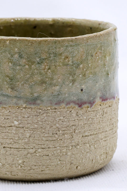Beige Picollo handmade ceramic espresso mug with milled stoneware finish by Ribera Handmade Ceramics.