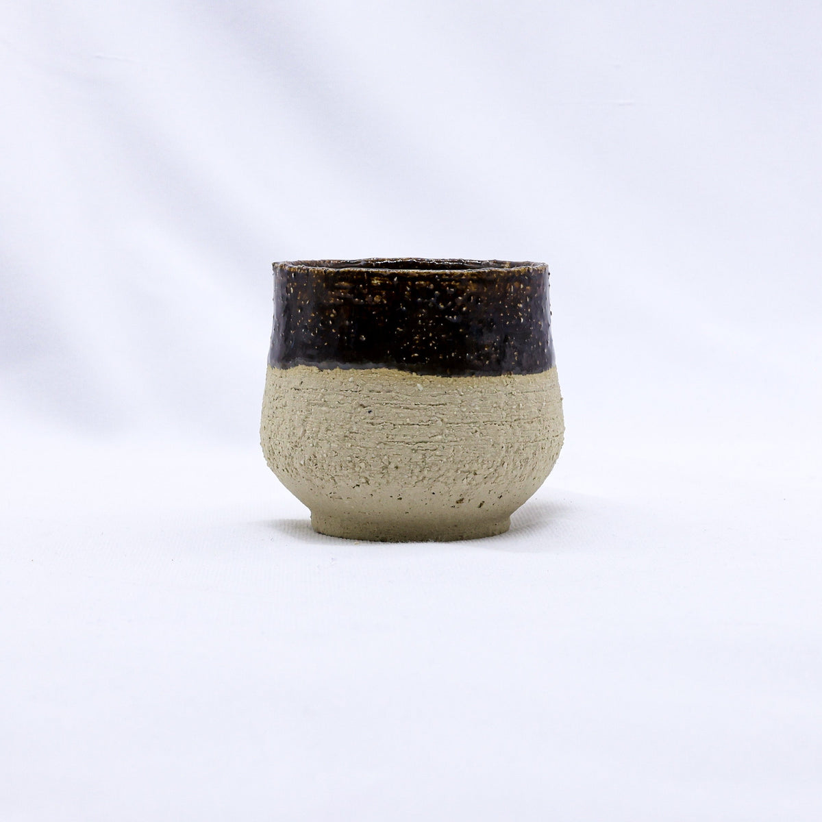 Handmade ceramic cappuccino mug by Ribera Handmade Ceramics, featuring a textured stoneware design and a smooth finish.