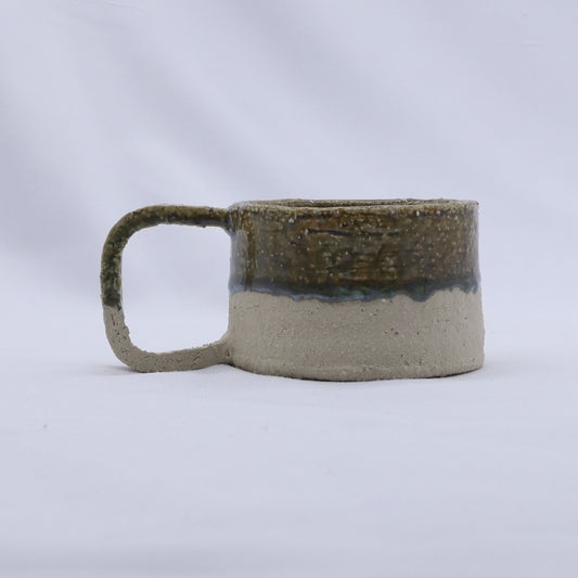 Beige Grande handmade stoneware ceramic mug by Ribera Handmade Ceramics, showcasing its large, textured, and artisanal design.