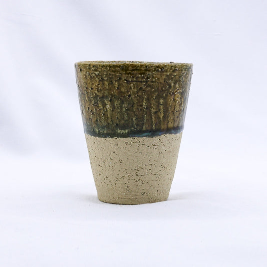 Handmade Bluverde Quadra ceramic cup by Ribera Handmade Ceramics, tall stoneware mug with a textured, milled stoneware finish.