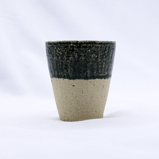 Ribera Handmade Ceramics Blunero Quadra Milled Stoneware tall ceramic cup with a textured, handcrafted finish.