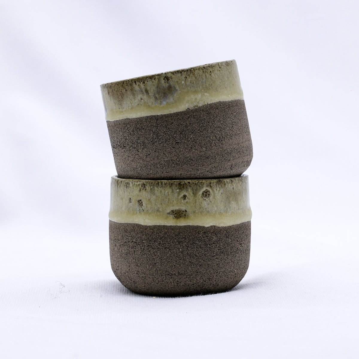 Grey ceramic espresso mug by Bluverde Picollo, handmade stoneware from Ribera Handmade Ceramics, with a textured finish.