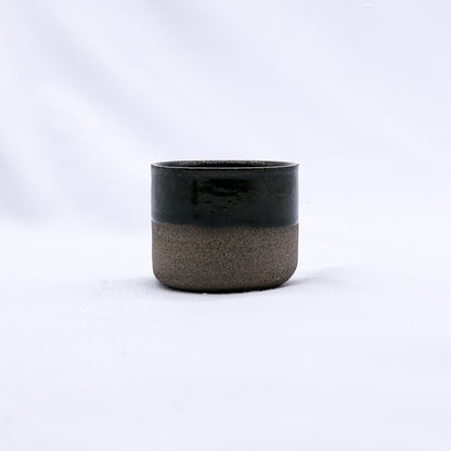 Green Picollo Smoked Grey handmade ceramic espresso mug by Ribera Handmade Ceramics, showcasing its textured stoneware surface.