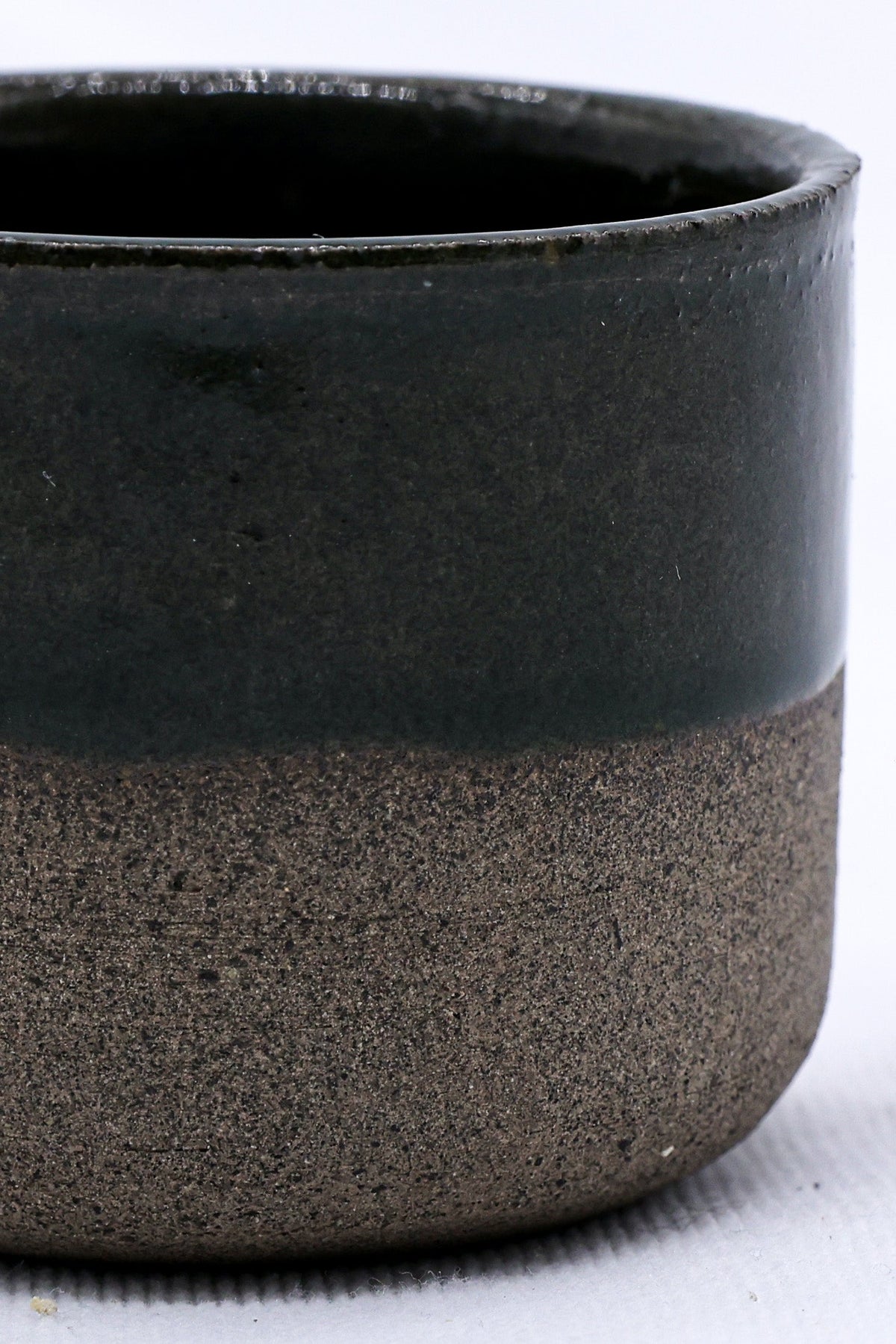 Green Picollo smoked grey handmade ceramic espresso mug by Ribera Handmade Ceramics, featuring a sleek stoneware design.