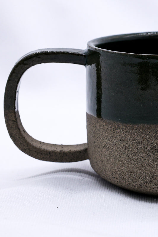 Large handmade ceramic mug by Ribera Handmade Ceramics, smoked grey stoneware with a smooth, rounded handle and matte finish.