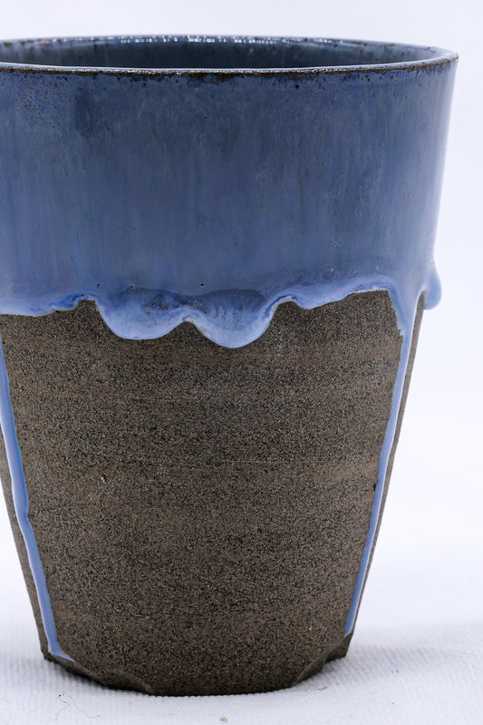 Handmade Blue and Smoked Grey Ceramic Quadra Tall Cup by Ribera Handmade Ceramics, showcasing its textured stoneware surface.