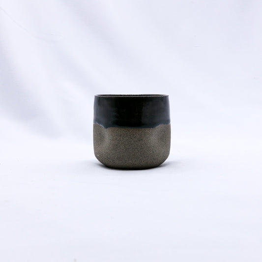 Handmade Verde Goccio ceramic smoked grey stoneware short cup by Ribera Handmade Ceramics, showcasing its textured surface and rustic finish.