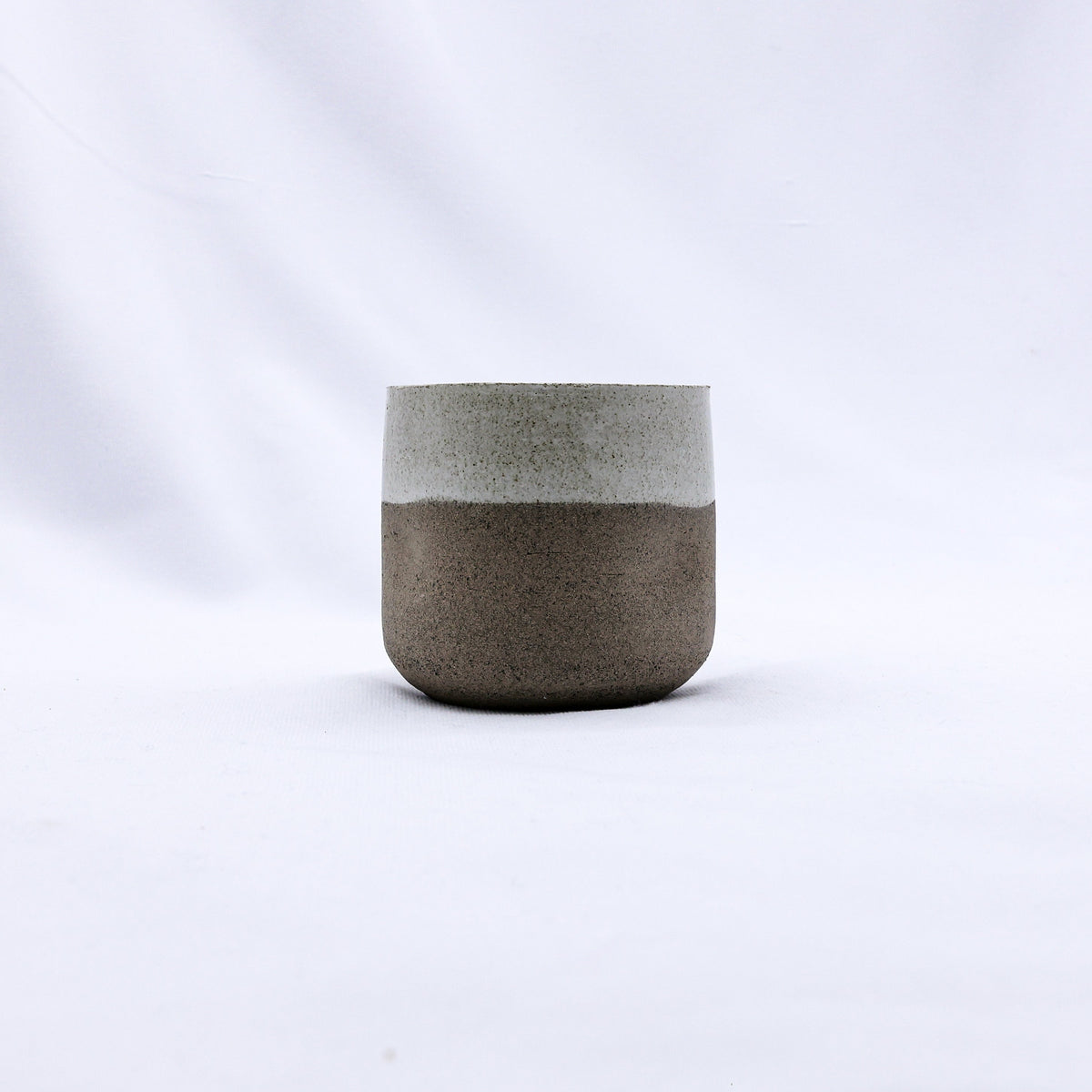 Ribera Handmade Ceramics Bianca Goccio ceramic short cup in smoked grey stoneware with a smooth, handcrafted finish.