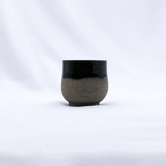 Handmade Bluverde smoked grey ceramic short cup by Ribera Handmade Ceramics with a smooth, rounded design.