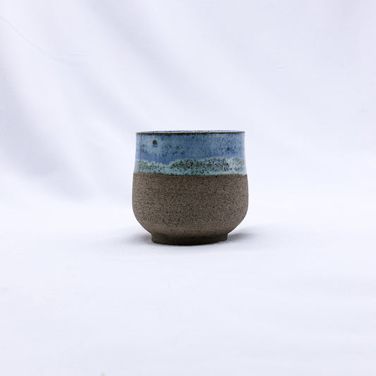 Handmade Ribera Ceramics smoked grey ceramic short cup, featuring a textured stoneware finish and ergonomic design.