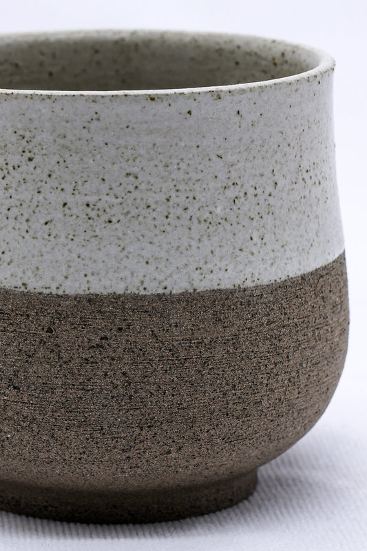 Handmade ceramic smoked grey short cup from Ribera Handmade Ceramics, showcasing a textured stoneware finish.
