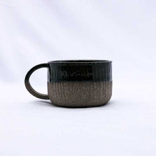 Handmade Bluverde Arte ceramic mug by Ribera Handmade Ceramics with smoked grey stoneware finish, featuring a smooth, rounded design.