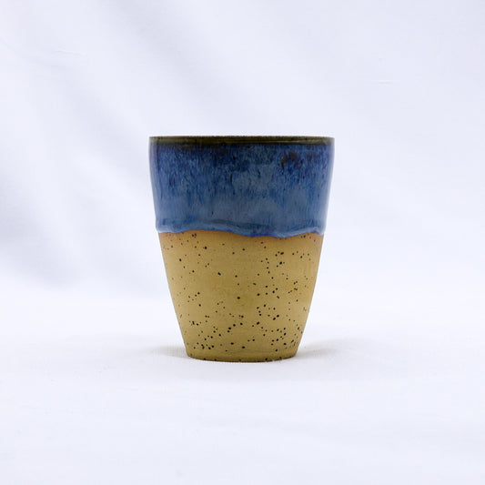 Ribera Handmade Ceramics Blunero Quadra stoneware ceramic mug with a textured, earthy finish, shown on a neutral background.