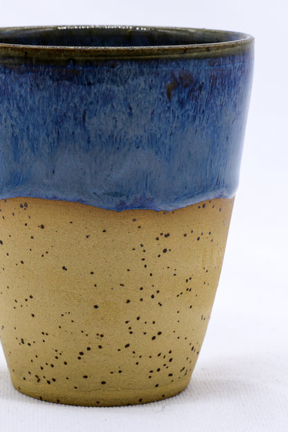 Ribera Handmade Ceramics Blunero Quadra stoneware ceramic mug with a textured, modern design and earthy tones.