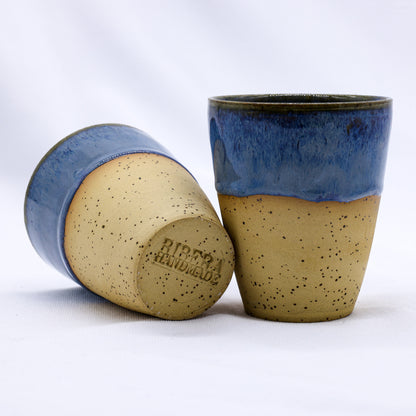 Ribera Handmade Ceramics Blunero Quadra stoneware ceramic mug with a smooth, rounded shape and earthy glaze finish.