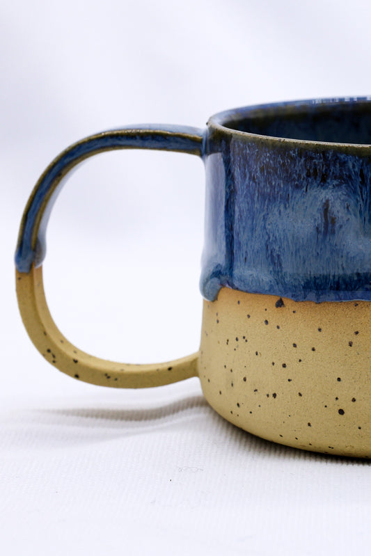 Large handmade stoneware ceramic mug by Ribera Handmade Ceramics, featuring a textured, earthy finish and sturdy handle.
