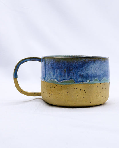 Handmade Bluverde Grande stoneware ceramic mug by Ribera Handmade Ceramics, featuring a glazed blue finish and sturdy handle.