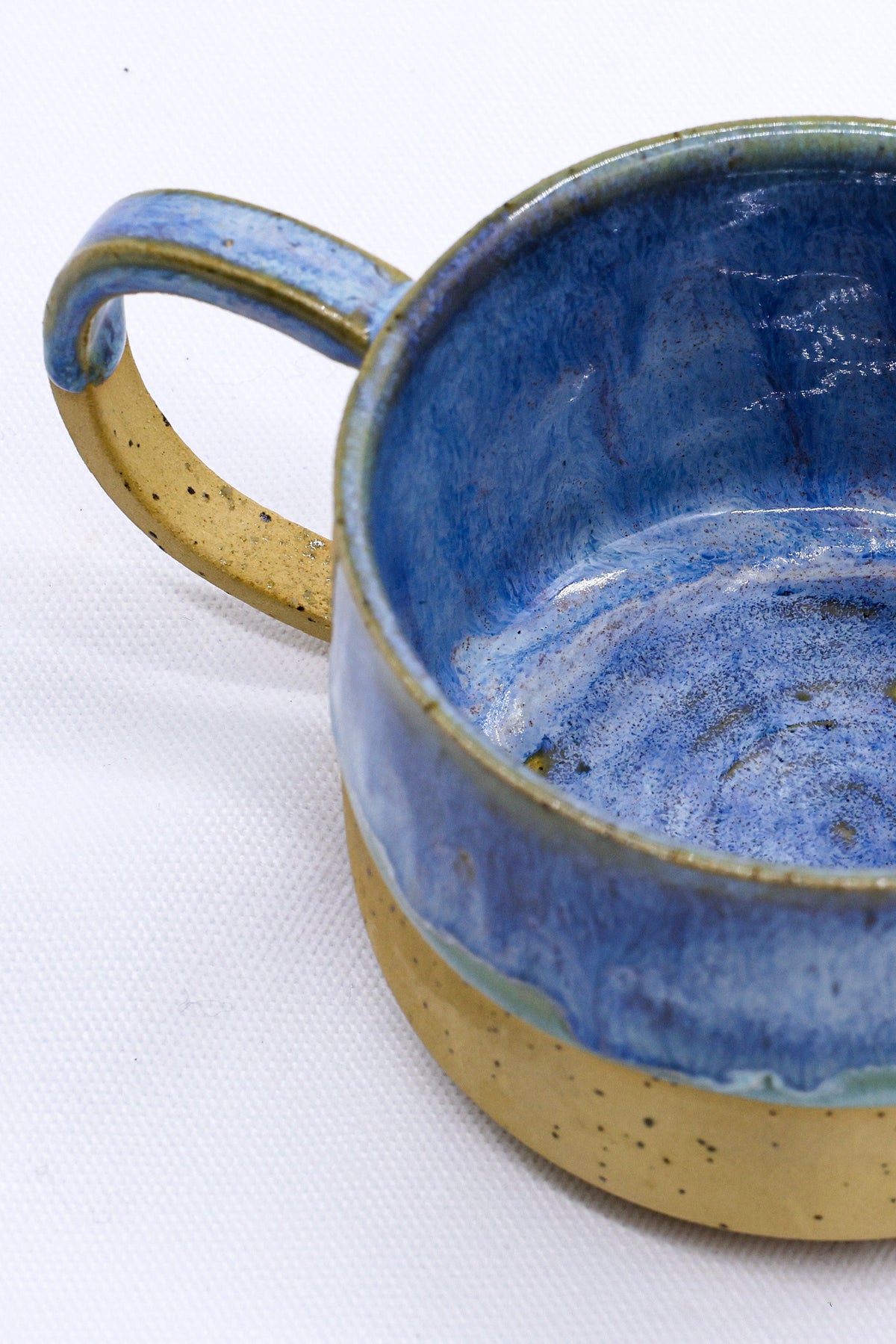 Handmade Bluverde Grande stoneware ceramic mug by Ribera Handmade Ceramics with a glazed blue finish and sturdy handle.