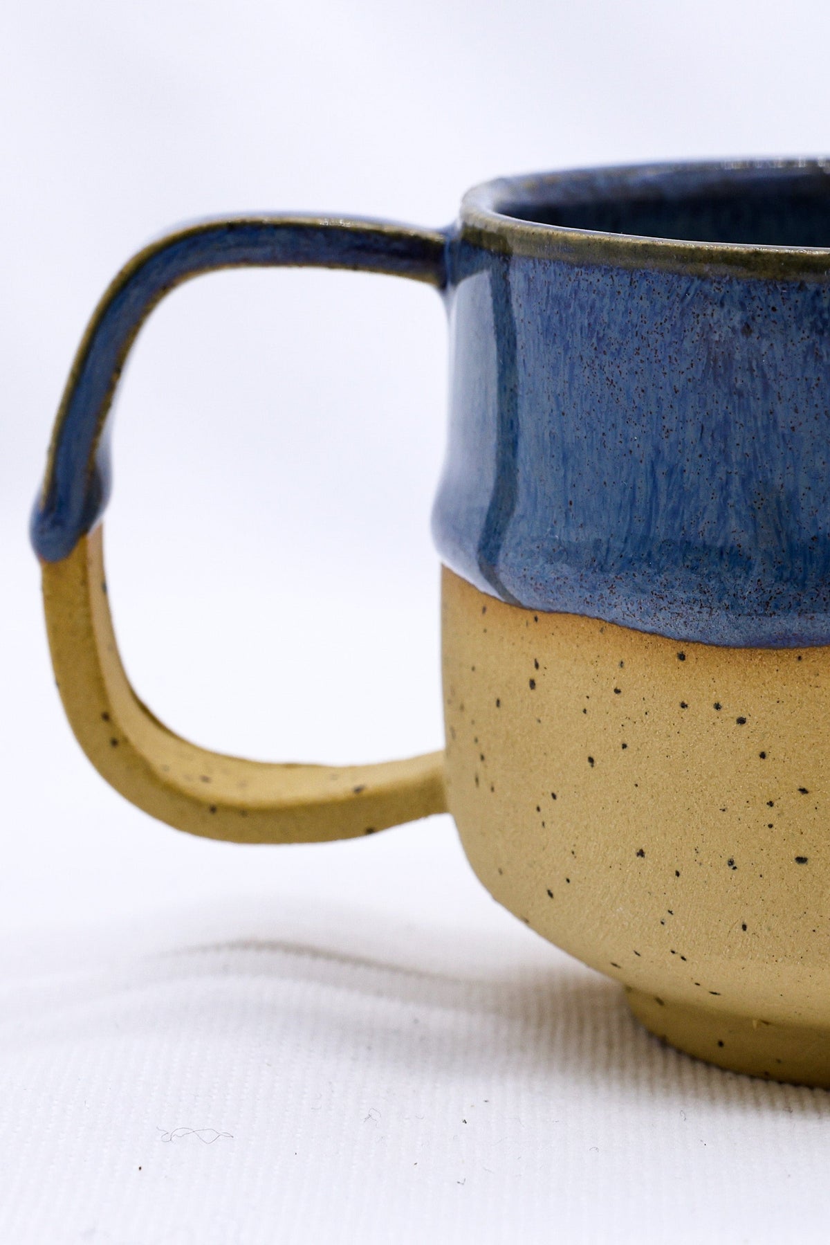 Ribera Handmade Ceramics Bluvio Sienna stoneware ceramic mug with a handcrafted glazed finish and ergonomic handle.
