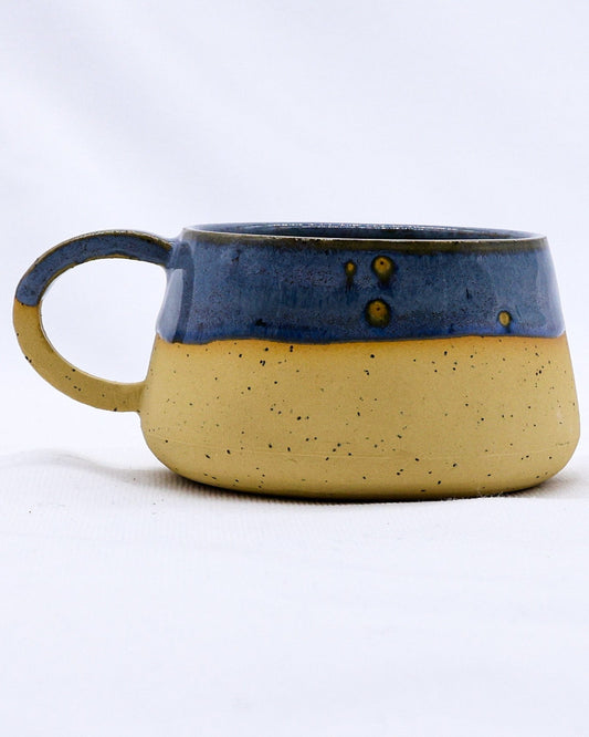 Ribera Handmade Ceramics Bluvio Belluma stoneware ceramic mug with a textured, earthy finish and classic mug shape.