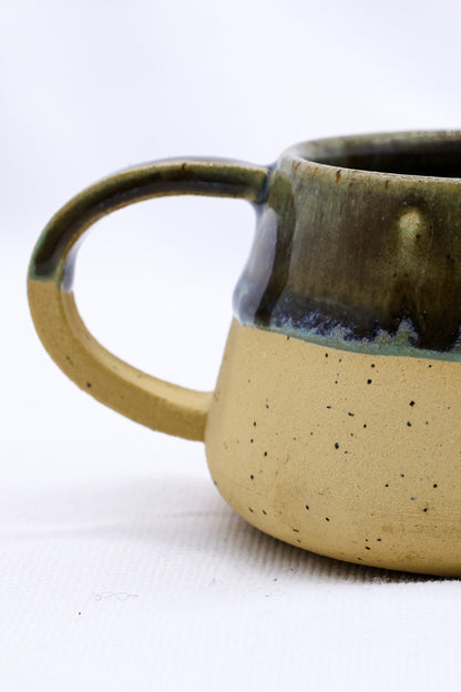 Bluevio Belluma handmade stoneware ceramic mug by Ribera Handmade Ceramics, featuring a textured, earthy design.