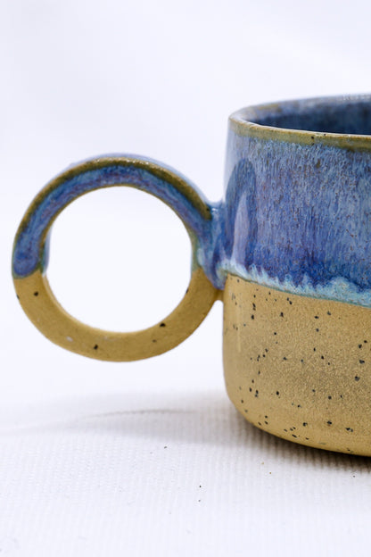 Handmade Blulume Perugia stoneware ceramic mug by Ribera Handmade Ceramics, featuring a blue glaze and textured ceramic surface.