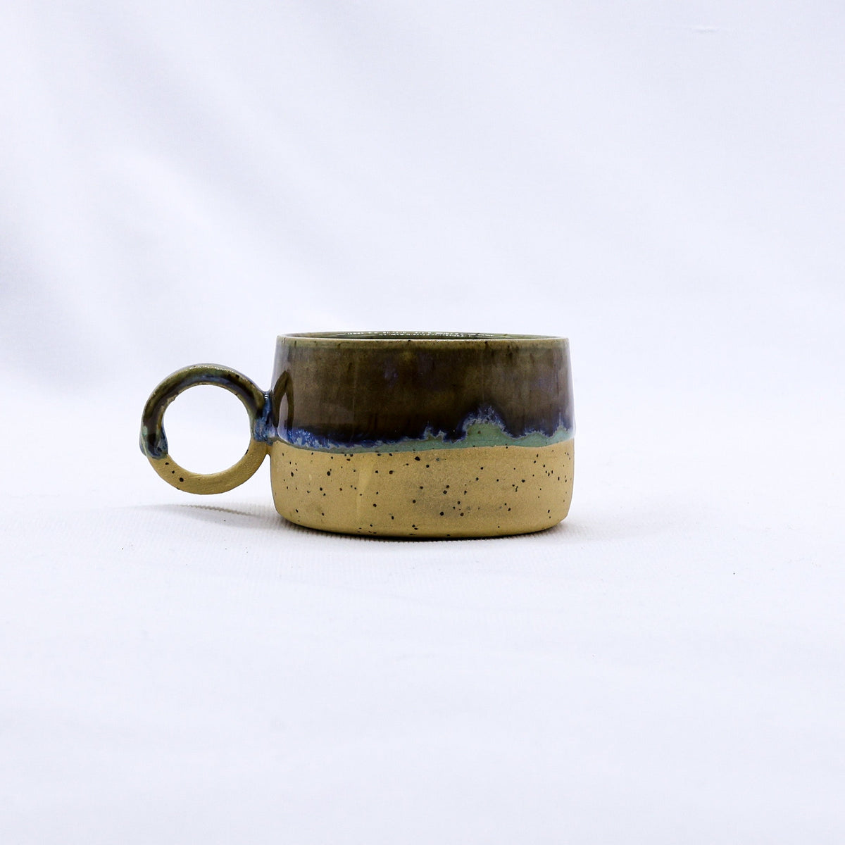 Ribera Handmade Ceramics Bluvio Perugia ceramic mug with a textured stoneware finish and artisanal handcrafted details.