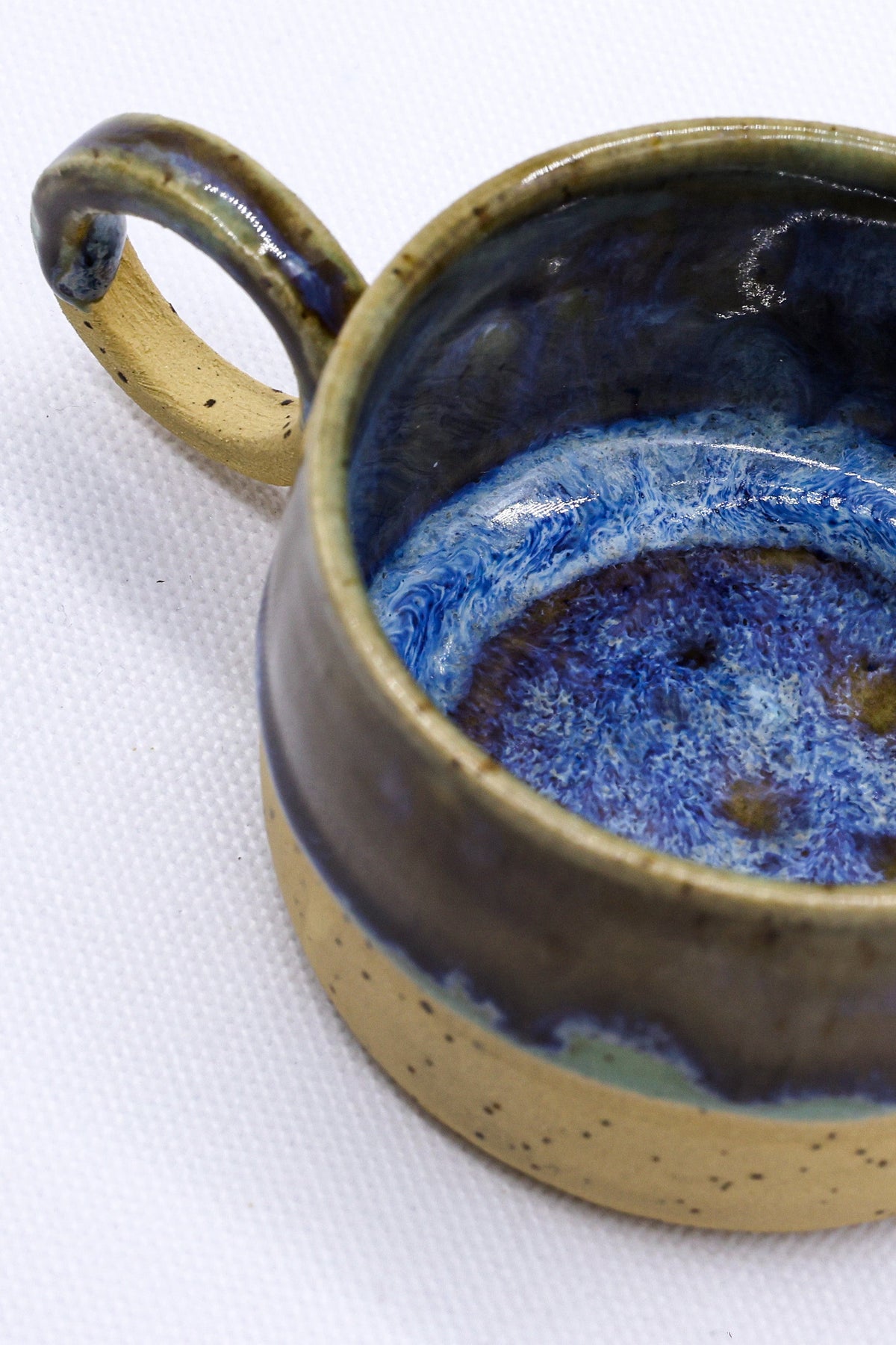 Ribera Handmade Ceramics Bluvio Perugia stoneware ceramic mug with a glazed finish, showcasing artisanal craftsmanship.
