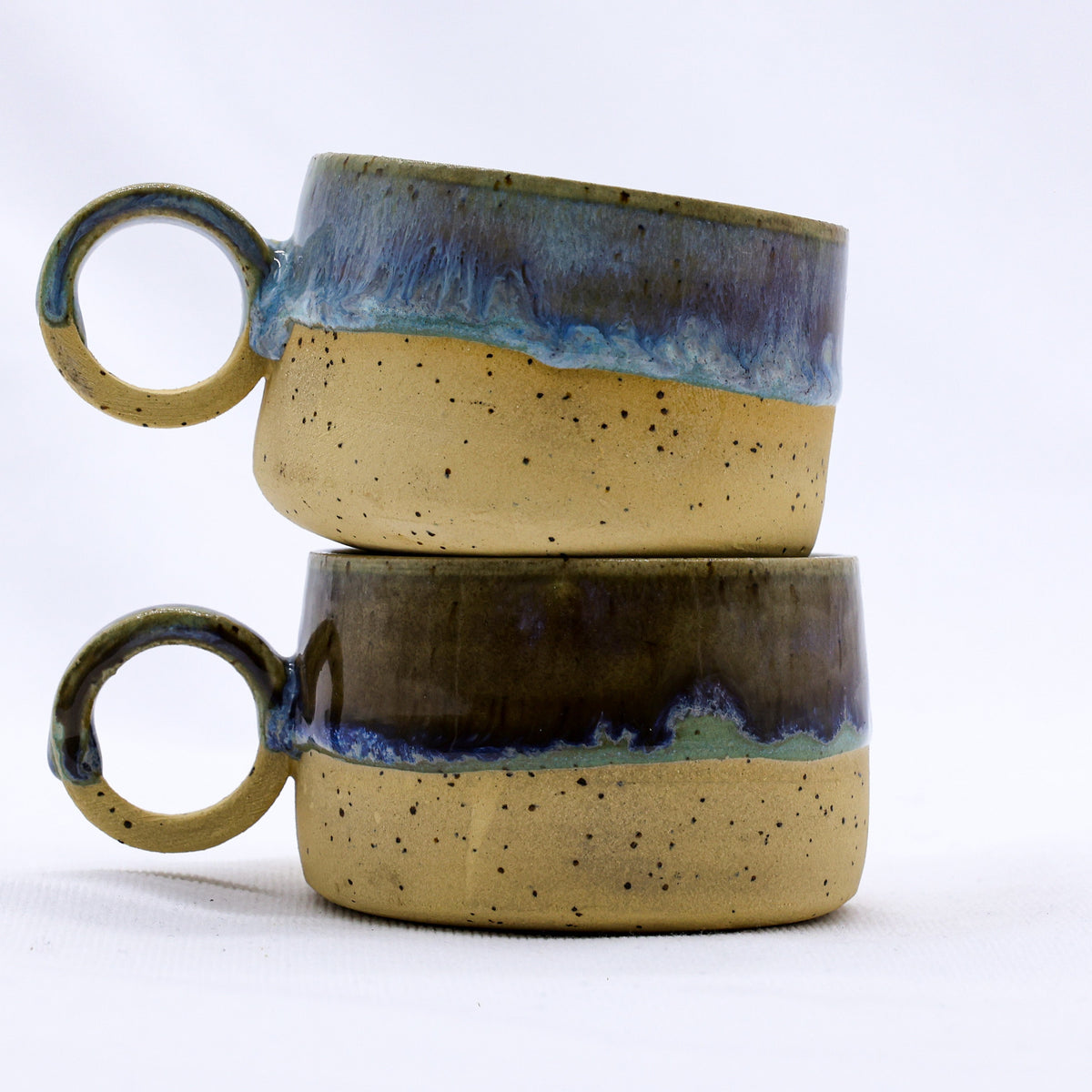Handmade stoneware ceramic mug from Ribera Handmade Ceramics, Perugia design with a rustic, artisanal finish.