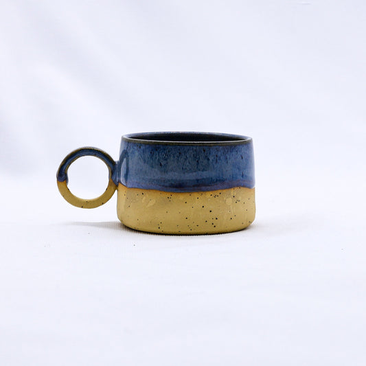 Handmade stoneware ceramic mug from Bluvio Perugia by Ribera Handmade Ceramics, featuring a textured, earthy finish.