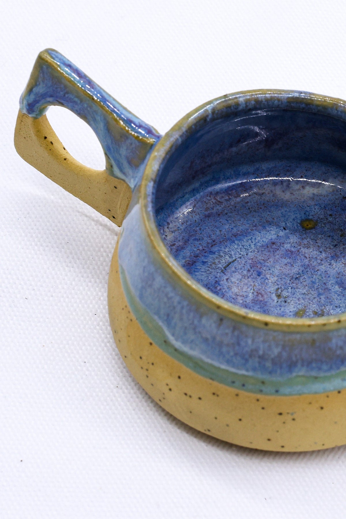 Handmade Bluverde Formo ceramic coffee mug by Ribera Handmade Ceramics, featuring a glazed stoneware finish and ergonomic handle.