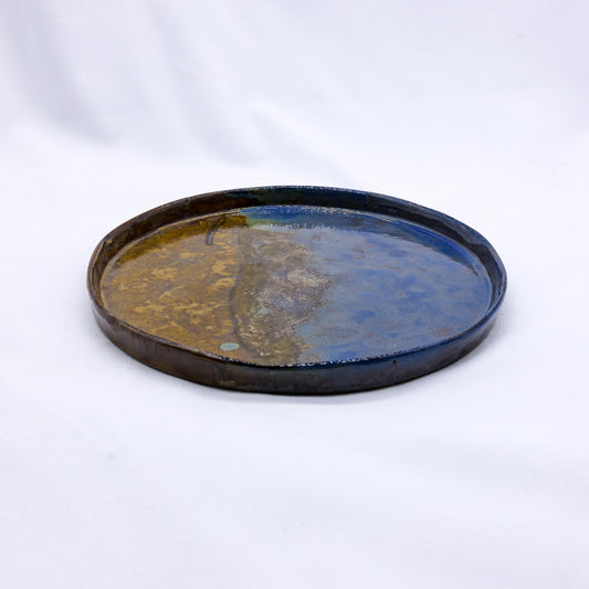 Large 27cm smoked grey ceramic dinner plate by Ribera Handmade Ceramics, crafted from stoneware with a textured, handmade finish.
