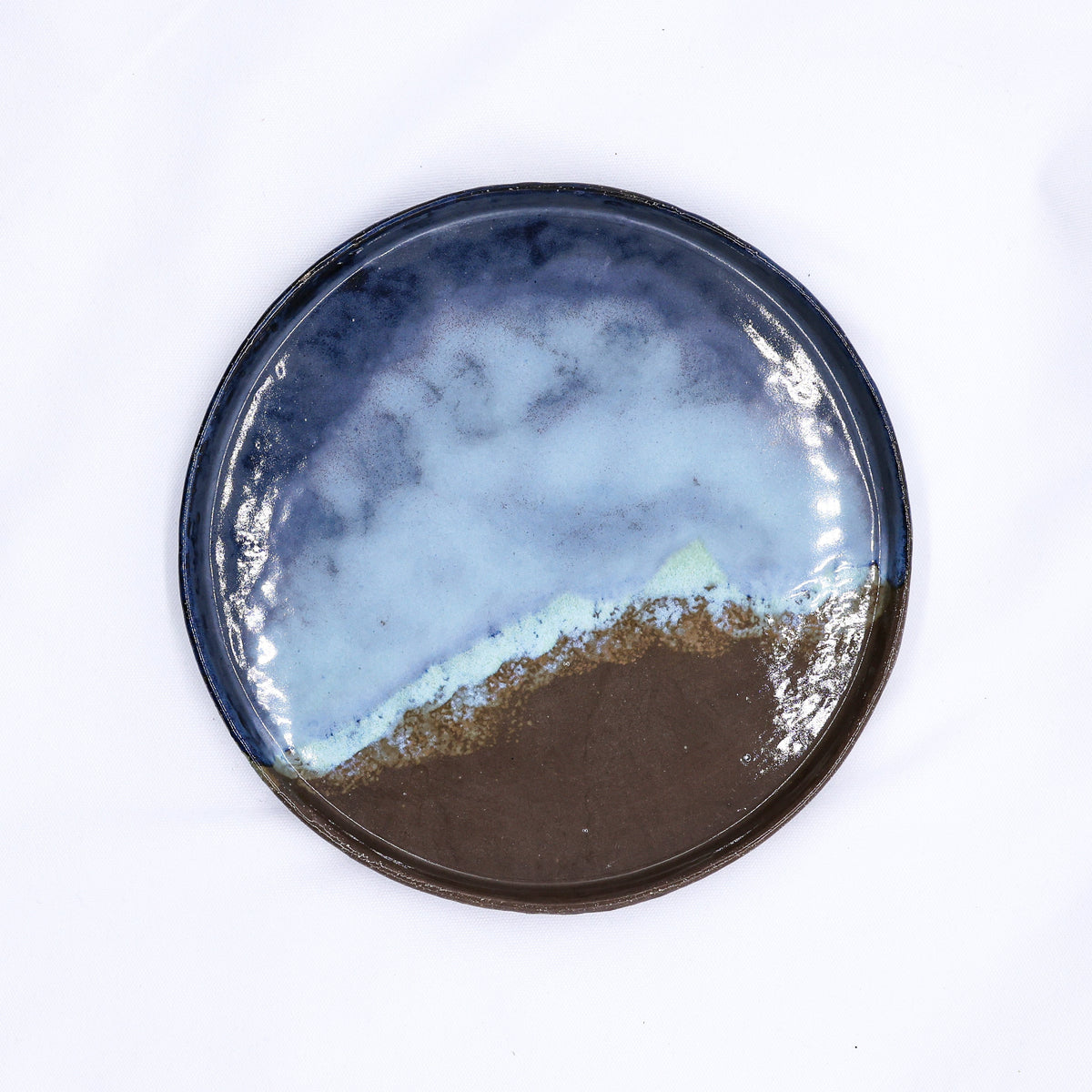 Large 27 cm Seabrook smoked grey ceramic dinner plate by Ribera Handmade Ceramics, showcasing handmade stoneware craftsmanship.