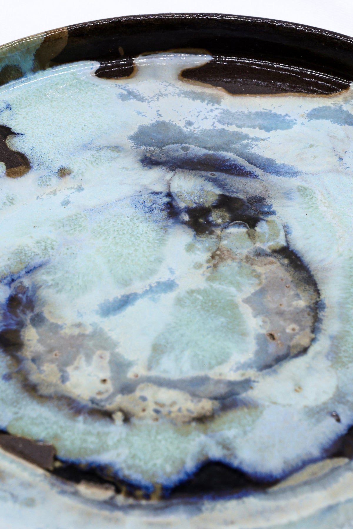 Large 27 cm Tidepool smoked grey ceramic dinner plate by Ribera Handmade Ceramics, handcrafted stoneware with a textured finish.