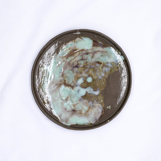Large 27 cm white smoked grey stoneware ceramic dinner plate by Ribera Handmade Ceramics, showcasing its handmade textured surface.