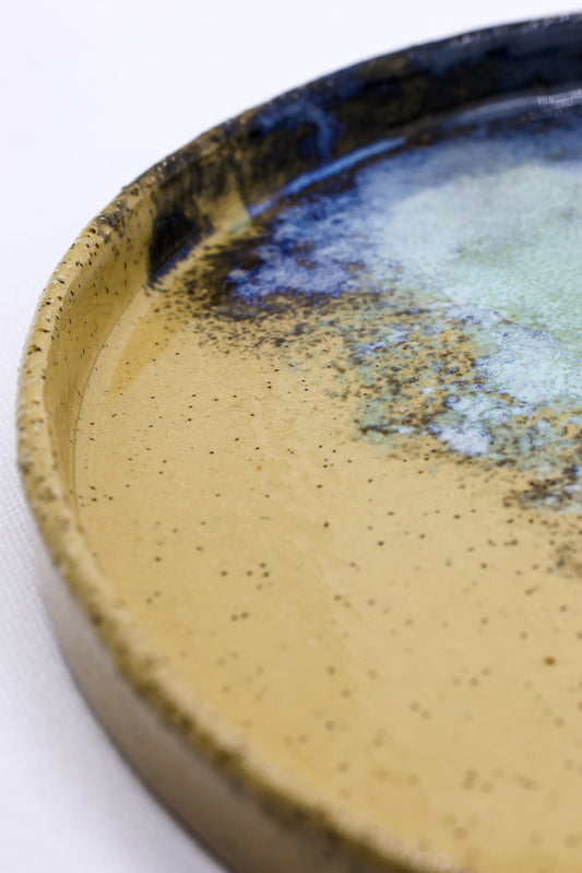A 27 cm handmade ceramic dinner plate from Ribera Handmade Ceramics with a textured Aegean stoneware finish.
