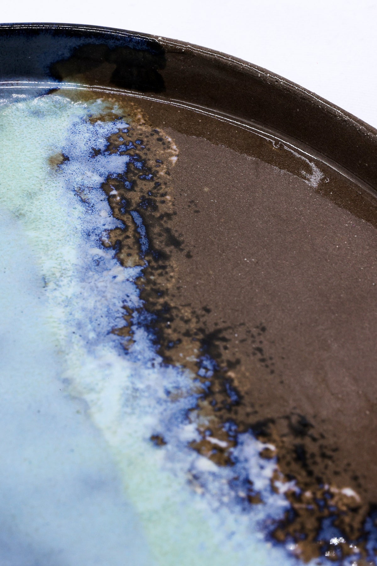 Large 23 cm Seabrook smoked grey ceramic dinner plate by Ribera Handmade Ceramics, showcasing a textured stoneware surface.