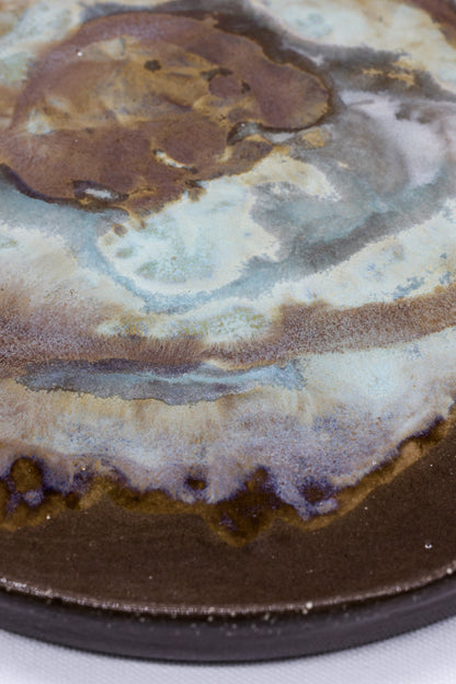 Large 23 cm Tidepool Smoked Grey ceramic dinner plate by Ribera Handmade Ceramics featuring a textured stoneware finish.