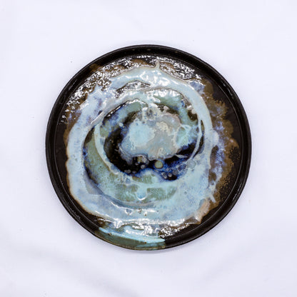 Large 23 cm Coralight smoked grey stoneware ceramic dinner plate by Ribera Handmade Ceramics, showcasing a textured, handcrafted design.