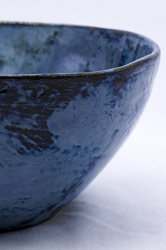 Small smoked grey and tidal blue handmade ceramic stoneware dinner bowl by Ribera Handmade Ceramics, showing smooth glazed surface.