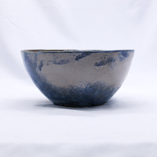 Large blue handmade ceramic dinner bowl with stone reef design from Ribera Handmade Ceramics, showcasing its textured stoneware surface.