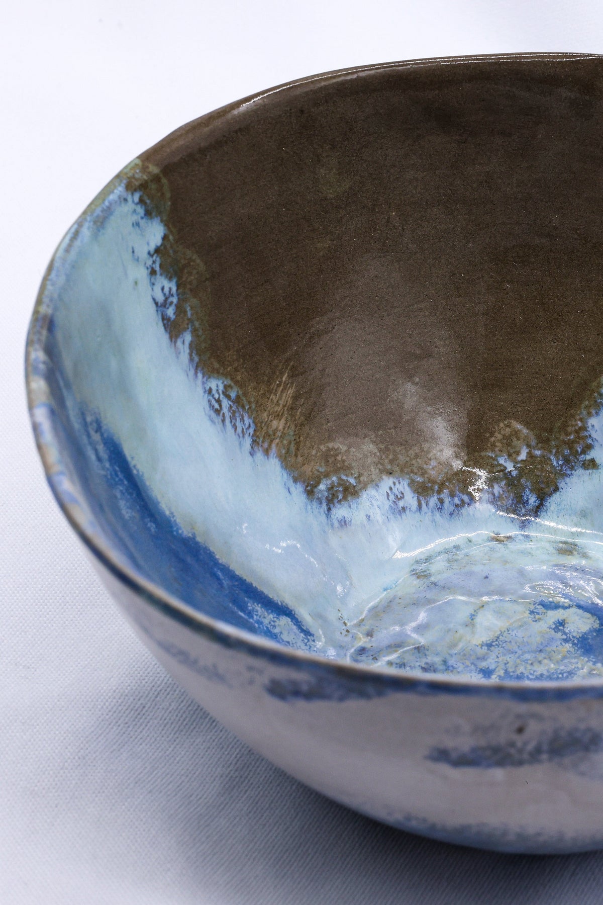 Large Reef Blue handmade ceramic dinner bowl by Ribera Handmade Ceramics, featuring a textured stoneware surface and vibrant blue glaze.