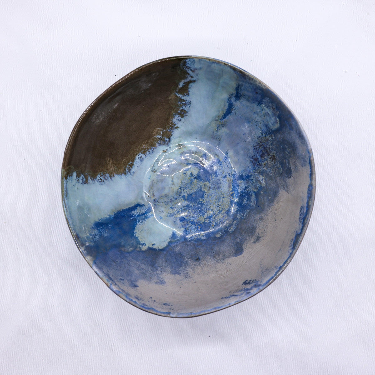 Large blue stone reef ceramic dinner bowl by Ribera Handmade Ceramics, featuring a textured stoneware surface.